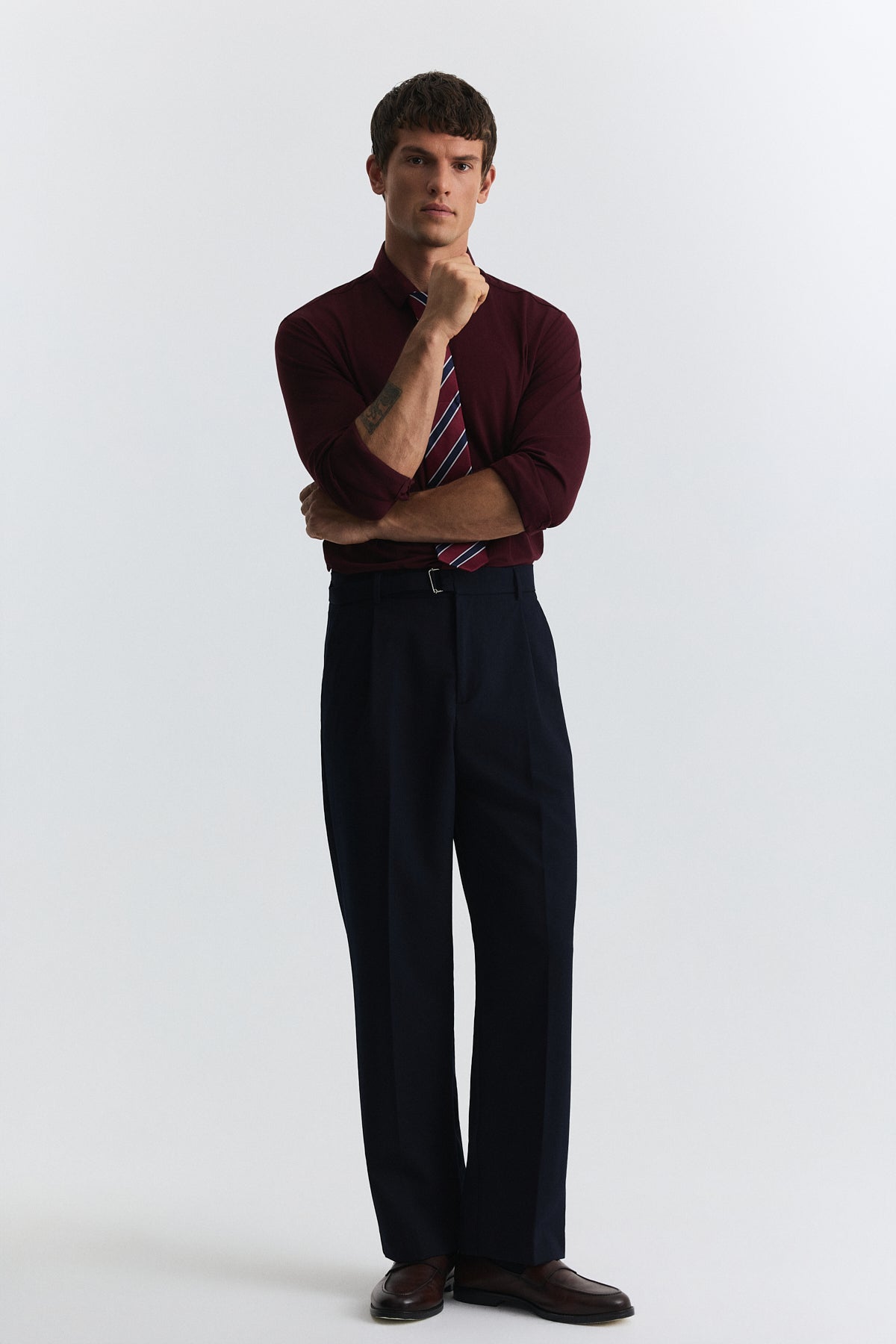 Arched-Waist Pleated Pants